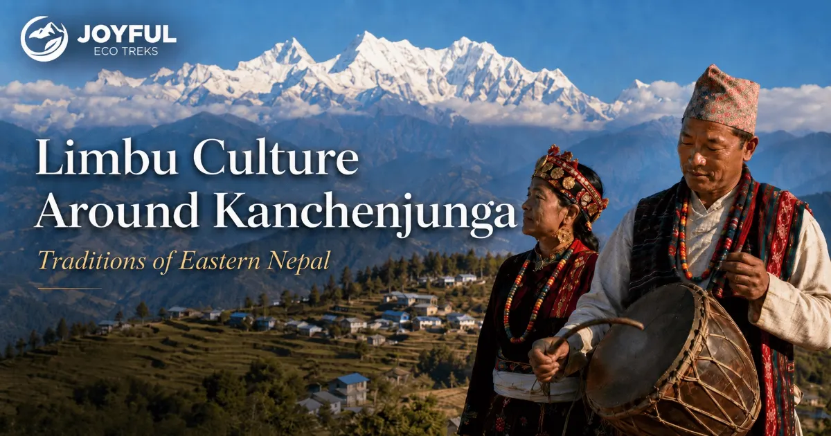 Limbu people in traditional dress with a Chyabrung drum beneath Kanchenjunga in eastern Nepal